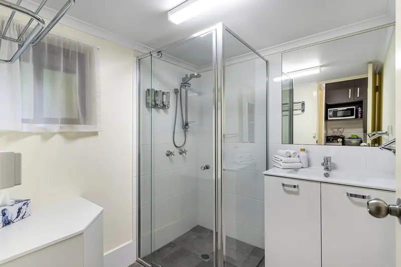 Bathroom with a glass shower and vanity