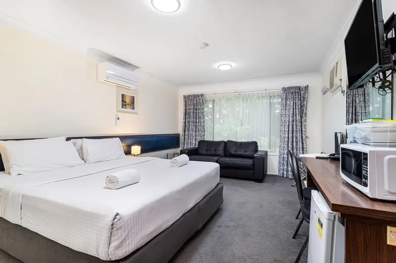 King suite with a lounge area and kitchenette