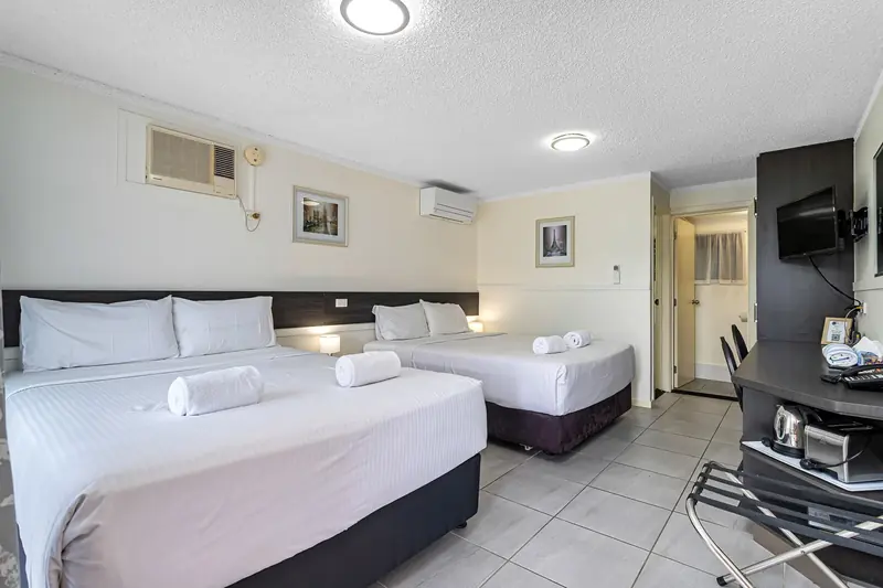Two queen beds side by side in the twin room